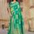 Green woven banarasi saree with blouse