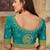 Green woven banarasi saree with blouse