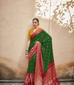 Green woven silk saree with blouse