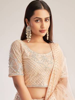 Peach embroidered net semi stitched lehenga 2