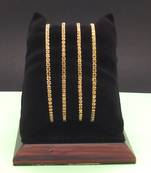 Gold bangles-and-bracelets