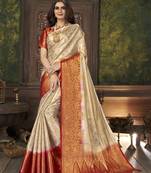 Beige woven banarasi silk saree with blouse