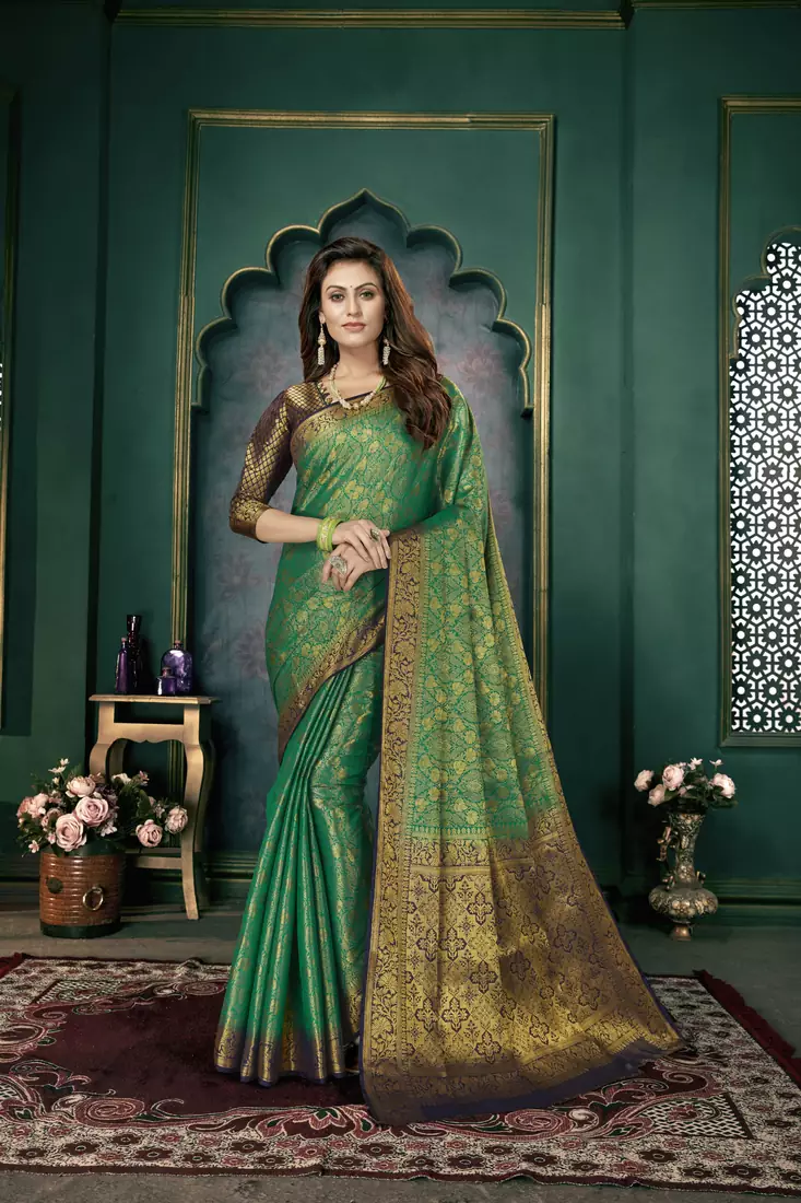 Green woven banarasi silk saree with blouse