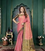 Light pink woven banarasi silk saree with blouse