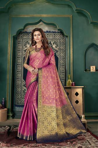 Pink woven banarasi silk saree with blouse