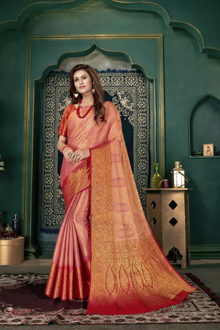Pink woven banarasi silk saree with blouse