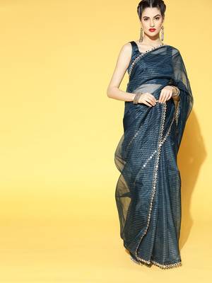 Teal woven organza saree with blouse 1