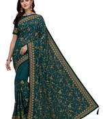 Teal embroidered silk blend saree with blouse
