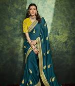 Green woven silk saree with blouse