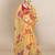 Light yellow printed organza saree with blouse
