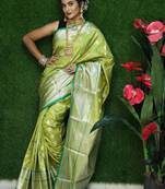 Green woven Faux kanchipuram silk saree with blouse