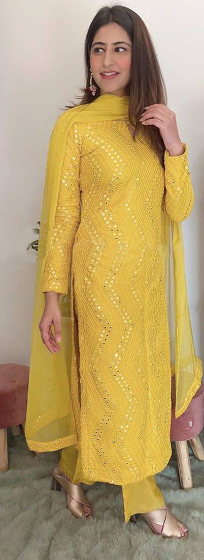 Phenomenal Light yellow Decorated with Mirror Faux Georgette Palazzo Salwar Suit