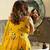 Yellow Color Georgette Fabric Thread And Zari Work Sleeveless Gown