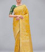 Yellow woven banarasi saree with blouse
