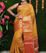 Mustard woven kanchipuram silk saree with blouse