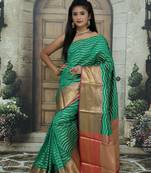 Green woven Faux kanchipuram silk saree with blouse