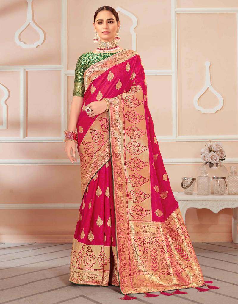 Rani pink woven banarasi silk saree with blouse