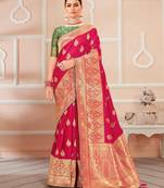 Rani pink woven banarasi silk saree with blouse