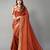 Rust printed silk blend saree with blouse