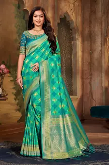 Light green woven banarasi silk saree with blouse
