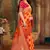 Orange woven banarasi silk saree with blouse