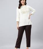 Cream embroidered viscose rayon tunics