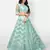 Enchanting Sea green Heavy Embroidered with Zarkan net semi stitched lehenga