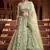 Mesmerizing Pista green Zari, Sequins and thread Embroidered net semi stitched lehenga