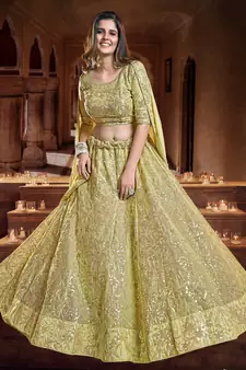 Catching Dark yellow Zari, Sequins and thread Embroidered georgette semi stitched lehenga