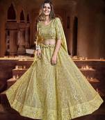 Catching Dark yellow Zari, Sequins and thread Embroidered georgette Semi Stitched Lehenga