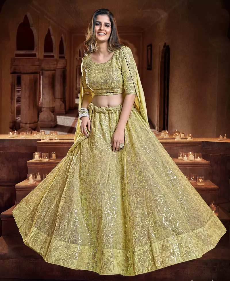 Catching Dark yellow Zari, Sequins and thread Embroidered georgette semi stitched lehenga