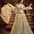 Delightful Yellow Zari, Sequins and thread Embroidered net semi stitched lehenga