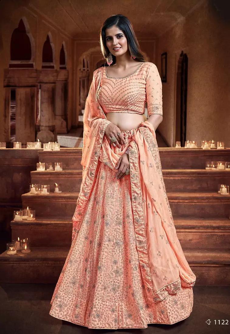 Bewitching Peach Orange Zari, Sequins and thread Embroidered georgette semi stitched lehenga