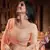 Bewitching Peach Orange Zari, Sequins and thread Embroidered georgette semi stitched lehenga