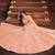 Bewitching Peach Orange Zari, Sequins and thread Embroidered georgette semi stitched lehenga