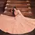 Bewitching Peach Orange Zari, Sequins and thread Embroidered georgette semi stitched lehenga