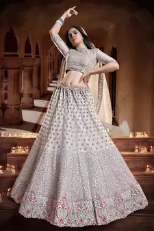 Fetching Grey Zari, Sequins and thread Embroidered net semi stitched lehenga