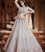 Fetching Grey Zari, Sequins and thread Embroidered net Semi Stitched Lehenga