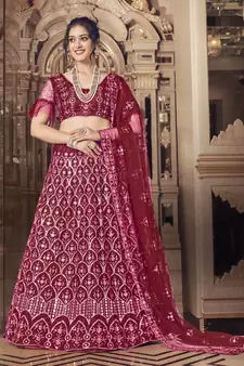 Engaging Maroon thread and sequins embroidered net semi stitched lehenga