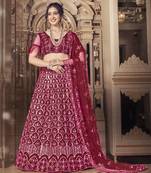 Engaging Maroon thread and sequins embroidered net Semi Stitched Lehenga choli with dupatta