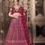 Engaging Maroon thread and sequins embroidered net semi stitched lehenga