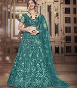 Seductive Dark Rama Green thread and Sequins embroidered net Lehenga choli