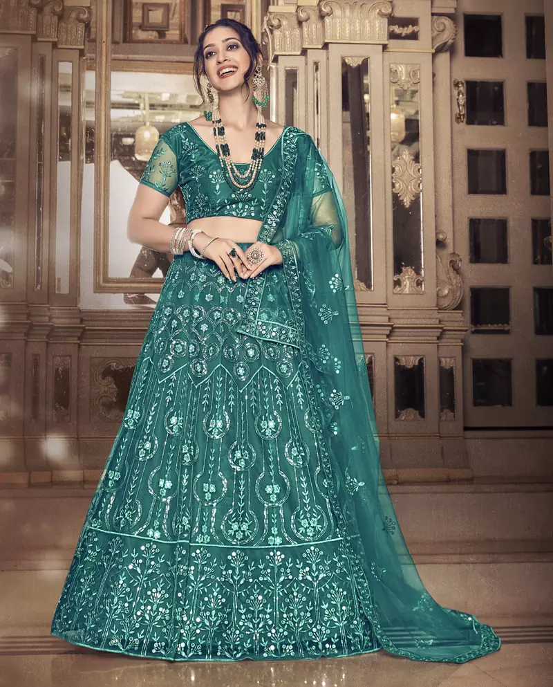 Seductive Dark Rama Green thread and Sequins embroidered net semi stitched lehenga
