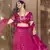 Alluring Rani pink thread and sequins embroidered net semi stitched lehenga
