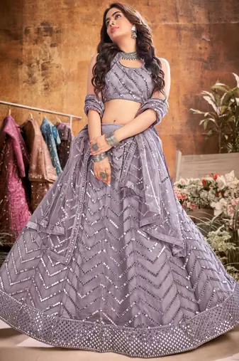 Entrancing Grey thread and sequins embroidered net semi stitched lehenga
