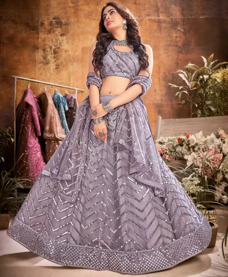 Entrancing Grey thread and sequins embroidered net semi stitched lehenga
