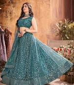 Enthralling Dark rama green thread and sequins embroidered party wear Lehenga choli