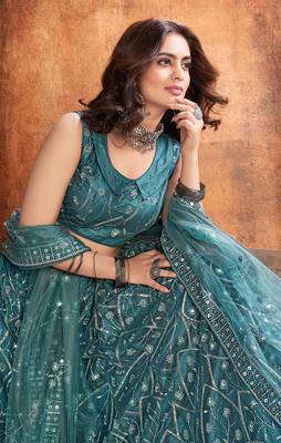 Enthralling Dark rama green thread and sequins embroidered party wear Lehenga choli 2