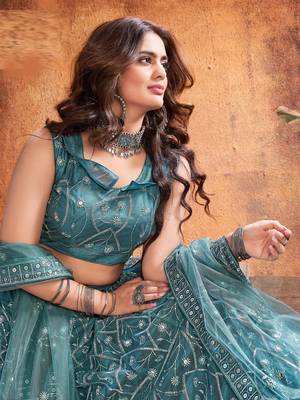 Enthralling Dark rama green thread and sequins embroidered party wear Lehenga choli 3