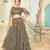 enticing Dark-grey thread embroidery net semi stitched lehenga